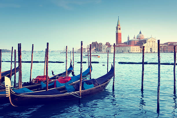 istock Gondolas and San Giorgio Maggiore church in Venic 505870877