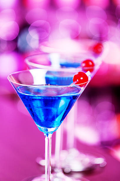 istock Blue Martini cocktail on a bar 505871834