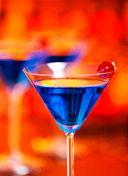 istock Blue Martini cocktail on a bar 505871952
