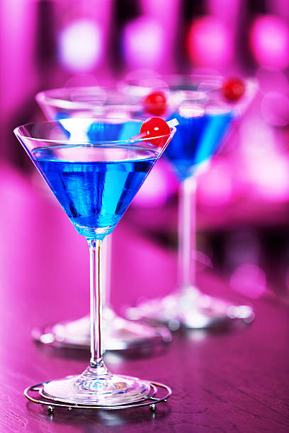 istock Blue Martini cocktail on a bar 505872196