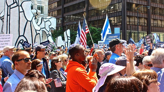 Chicago, IL, USA - July 28, 2014: American and Israeli flags at Jewish United Fund \