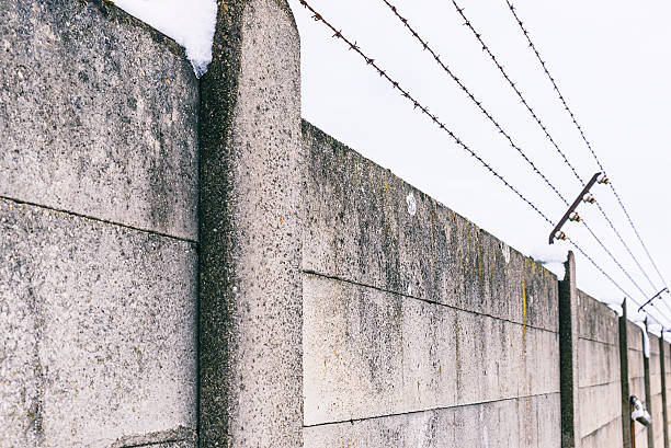 istock Dirty wall with fence. 505872982