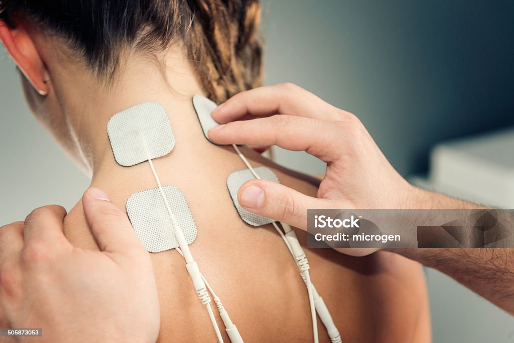 TENS treatment TENS treatment in physical therapy Physical Therapy Stock Photo