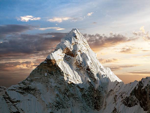 Evening view of Ama Dablam Evening view of Ama Dablam on the way to Everest Base Camp, Sagarmatha national park, Khumbu valley, Nepal base camp photos stock pictures, royalty-free photos & images