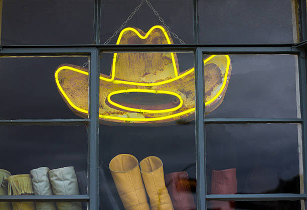 neon chapéu de caubói em amarelo brilhante - cowboy hat personal accessory equipment headdress - fotografias e filmes do acervo