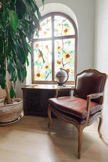 Close up of ancient solid wooden cabinet and armchair