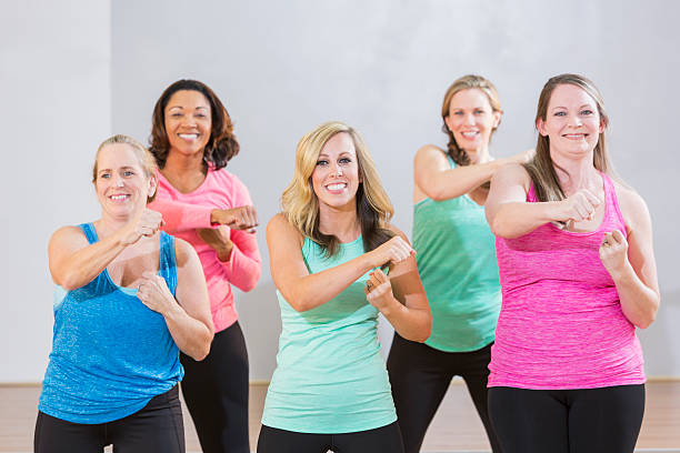 istock Five multi-racial women taking an aerobics class 505875950