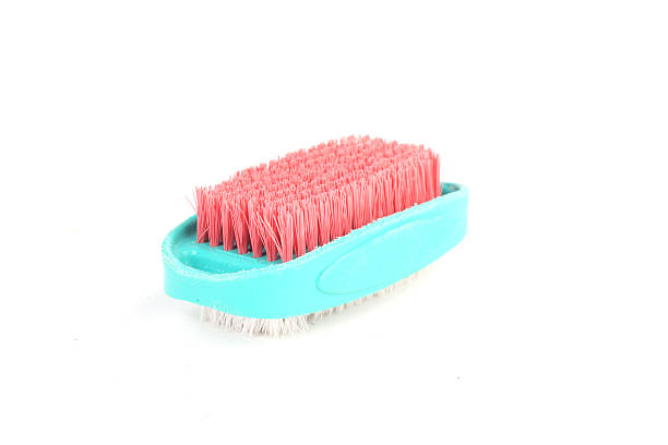 istock Blue white and red cleaning brush isolated on white background 505886197