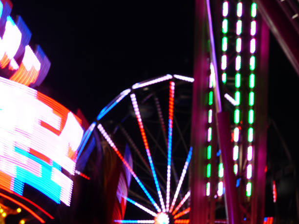 istock Illuminations Colorful Carnival, Fair Lights at Night Dreamy Focus Bokeh 505886368