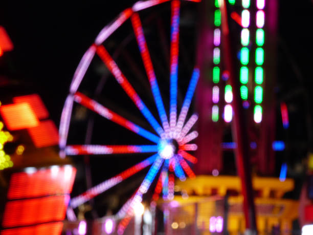 istock Illuminations Colorful Carnival, Fair Lights at Night Dreamy Focus Bokeh 505886400