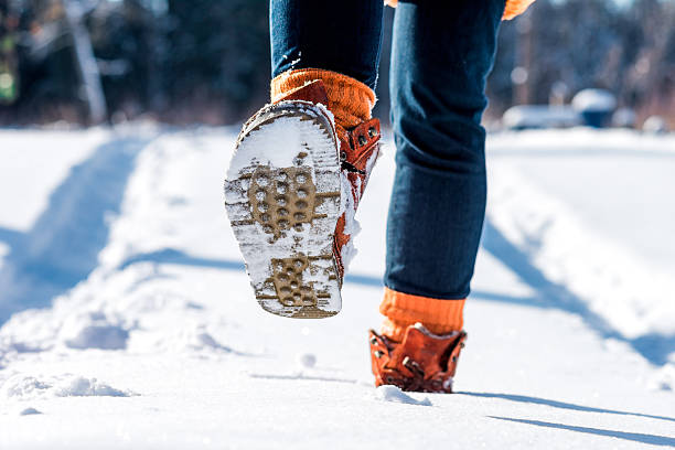 istock Steps on the snowy road 505886698