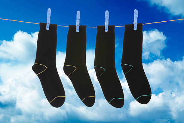 istock socks hanging to dry 505887527