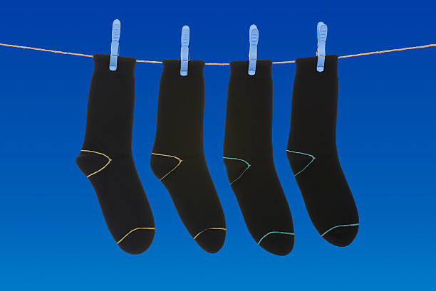 istock socks hanging to dry 505887531