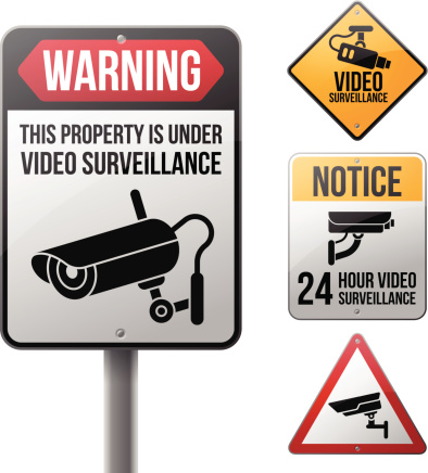 Video surveillance CCTV warning signs. EPS 10 file. Transparency effects used on highlight elements.