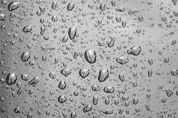 istock texture of raindrops on a car surface after raining 505888000