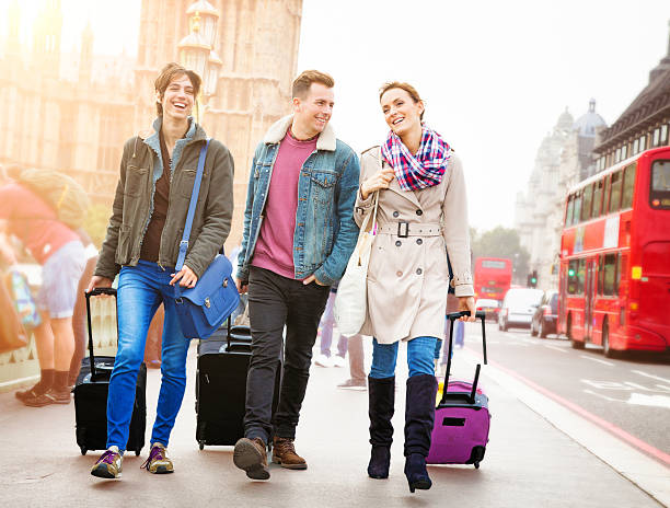 istock Three friends arriving in London 505888090