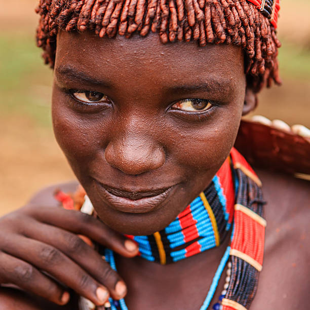 Young woman from Hamer tribe, Ethiopia, Africa The Hamer tribe is an indigenous group of people in Africa, and this tribe lives in the southwestern region of the Omo Valley near Kenya, Africa. They are largely pastoralists.http://bem.2be.pl/IS/ethiopia_380.jpg hamer tribe photos stock pictures, royalty-free photos & images