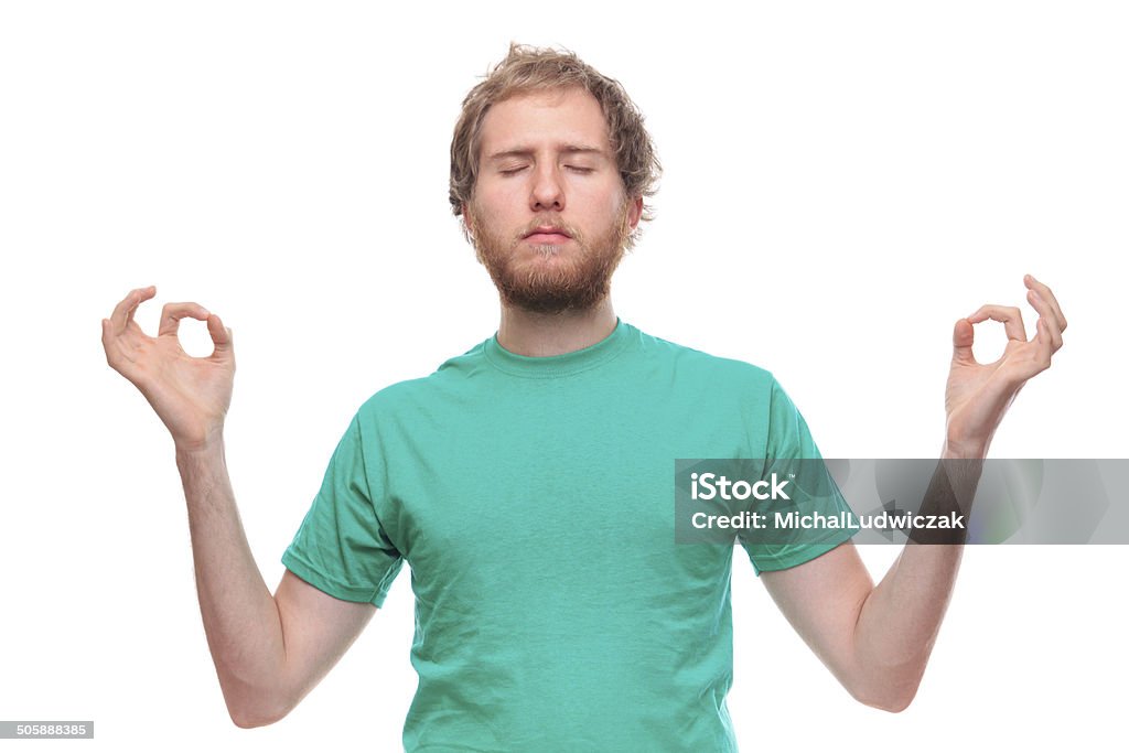 Man practicing yoga 20-29 Years Stock Photo