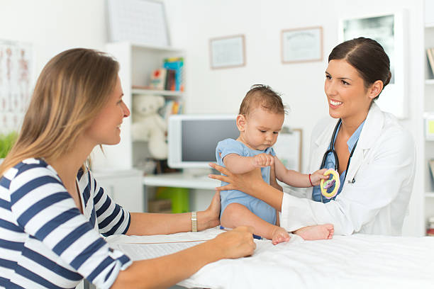 istock Cute baby boy at doctor's office. 505888483