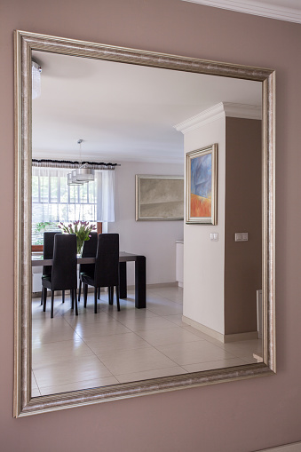 Luxury dining room - reflection in the mirror