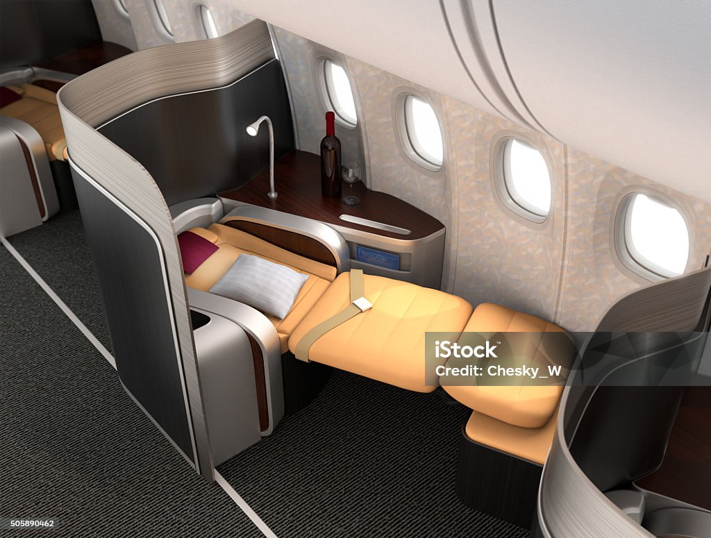 Nahaufnahme der luxuriösen business class-Sitzplatz mit metallic-silber Trennwand - Lizenzfrei Erste Klasse Stock-Foto