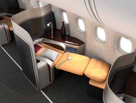 Close-up of luxurious business class seat with metallic silver partition. The seat laying down in flat position. 3D rendering image in original design.