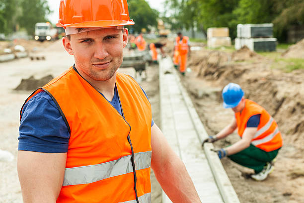 istock Construction worker in safety waistcoat 505891314