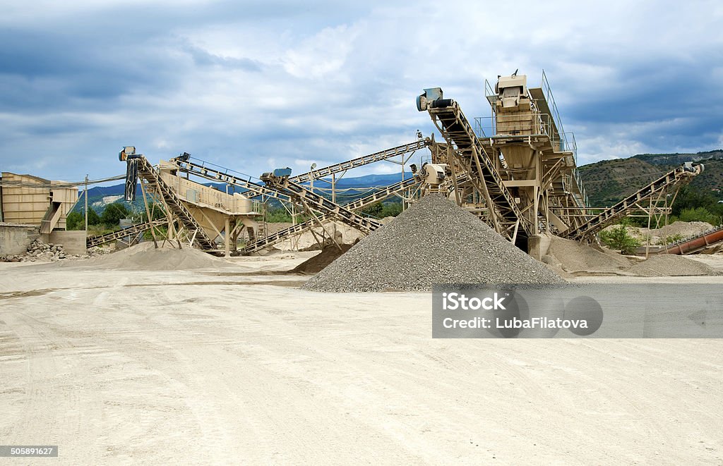 processing plant stones conveyor at the reprocessing plant of stones in career Cement Stock Photo