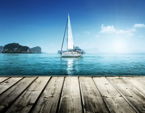 yacht and wooden platform