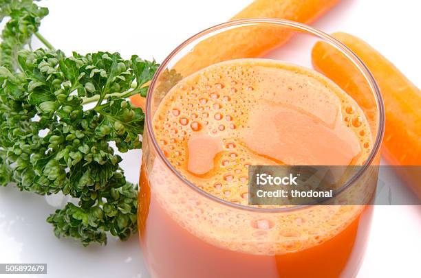 Composition With A Glass Of Carrot Juice And Fresh Carrots Stock Photo - Download Image Now