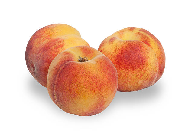 istock Three ripe red and yellow peach isolated 505892699