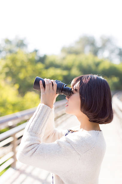 istock pretty girl standing pedestrian bridge 505896480