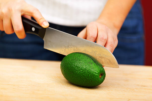 istock Young woman making salad 505898318