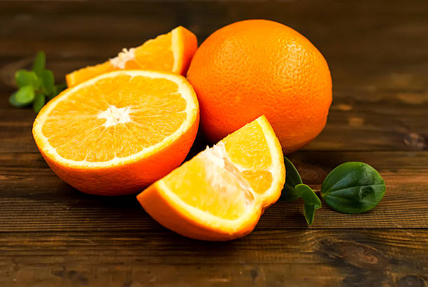 istock Group of oranges on the dark board 505898500