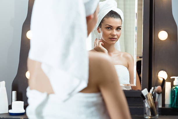 istock Pretty female looking in the mirror 505899454