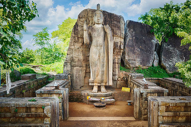 Avukana Buddha Statue Avukana Buddha Statue near Kekirawa, Sri Lanka anuradhapura stock pictures, royalty-free photos & images