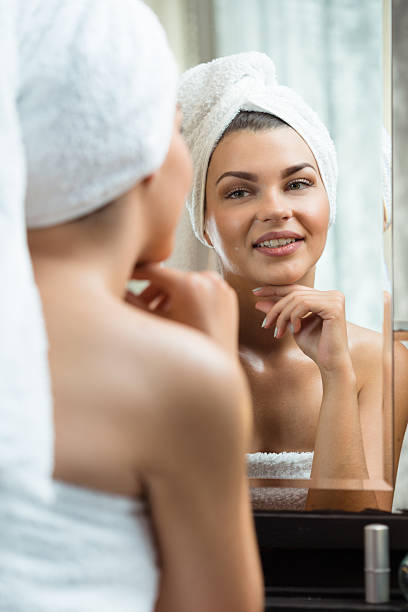 istock Smiling woman after refreshing shower 505911024