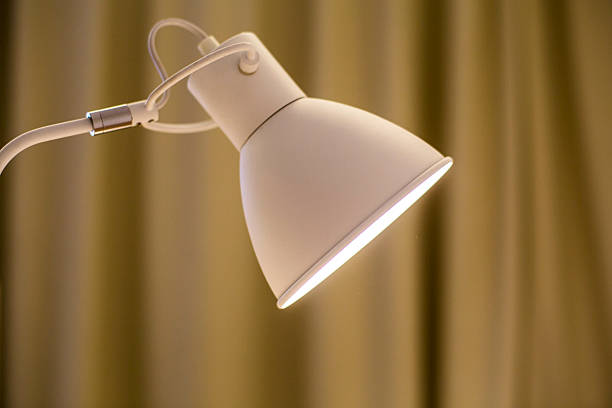istock light of desk lamp at night 505911126