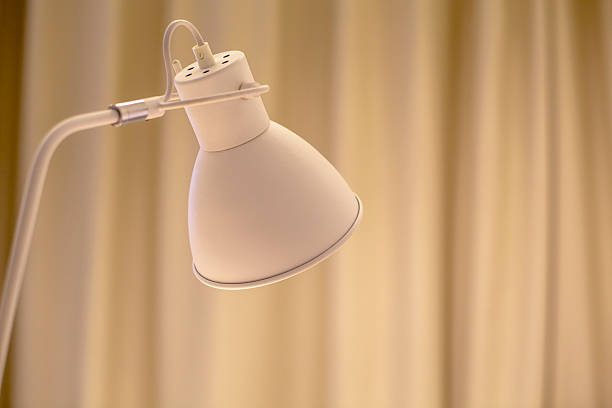 istock light of desk lamp at night 505911318