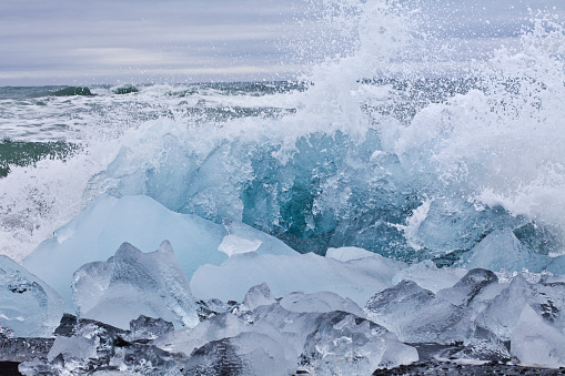 Floating icebergs in the Atlantic Ocean close to the glacier lagoon of Jökulsarlon. Iceland.