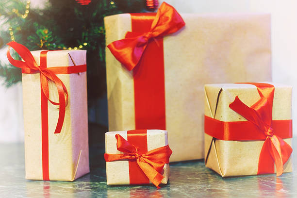 istock stack of gifts under a Christmas tree 505913074
