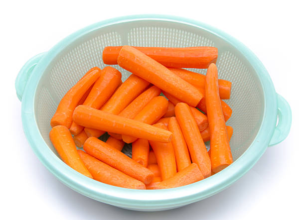 istock Fresh peeled carrots in a bowl 505913911