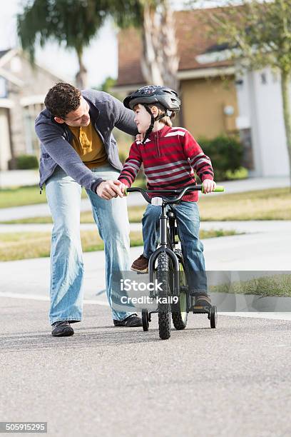 Learning To Ride Bicycle Stock Photo - Download Image Now - Cycling, 20-29 Years, 4-5 Years