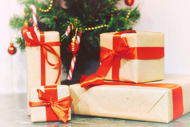 istock stack of gifts under a Christmas tree 505915306