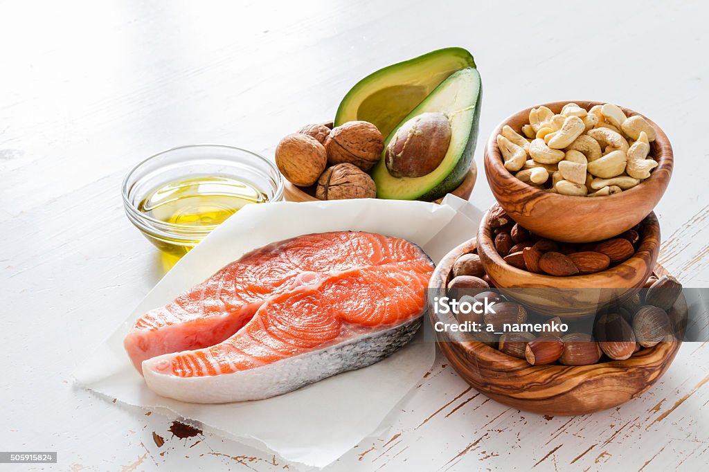 Selection of healthy fat sources Selection of healthy fat sources, copy space Fat - Nutrient Stock Photo