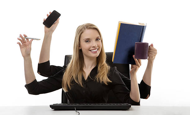istock busy woman at her desk 505916033