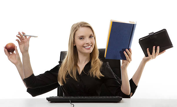 istock busy woman at her desk 505916037