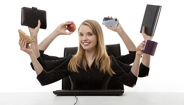 istock busy woman at her desk 505916069
