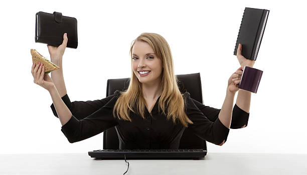 istock busy woman at her desk 505916071