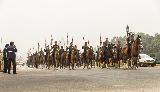 New Delhi, India – January 20, 2016: Troops of security wing doing rehearsal at Rajpath, toward India Gate from President's House to celebrate the upcoming Republic Day Celebration parade to be held on January 26, 2016. French President Francois Hollande is expected as a Chief Guest for the first time in Indian History.